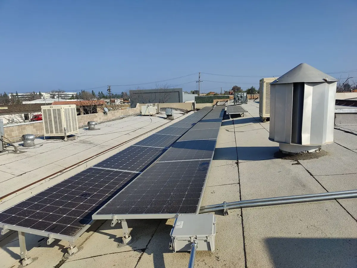 Rows of solar panels on a commercial flat roof